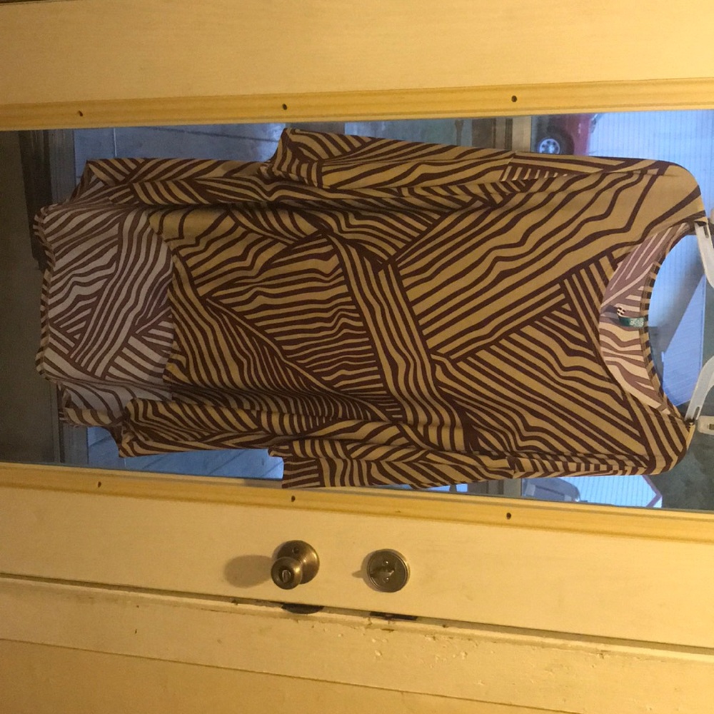 Quarter sleeve boutique style shirt, worn once.